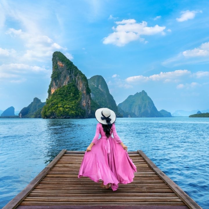 Tourist,Walking,On,Wooden,Bridge,In,Phang,Nga,Bay,,Thailand.